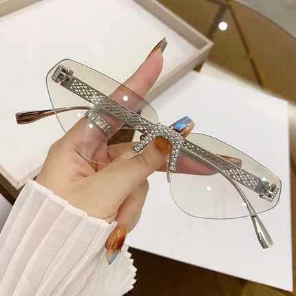 Women's Sexy Cat Eye Rimless Rhinestone Sunglasses Luxury Brand Designer Retro Punk Metal Sunglasses Men's UV400 Driving Glasses