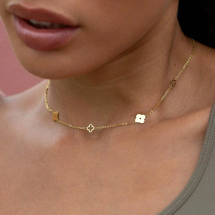 Japan and South Korea style simple stainless steel four-leaf clover plum blossom interlocking pendant necklace for daily wear